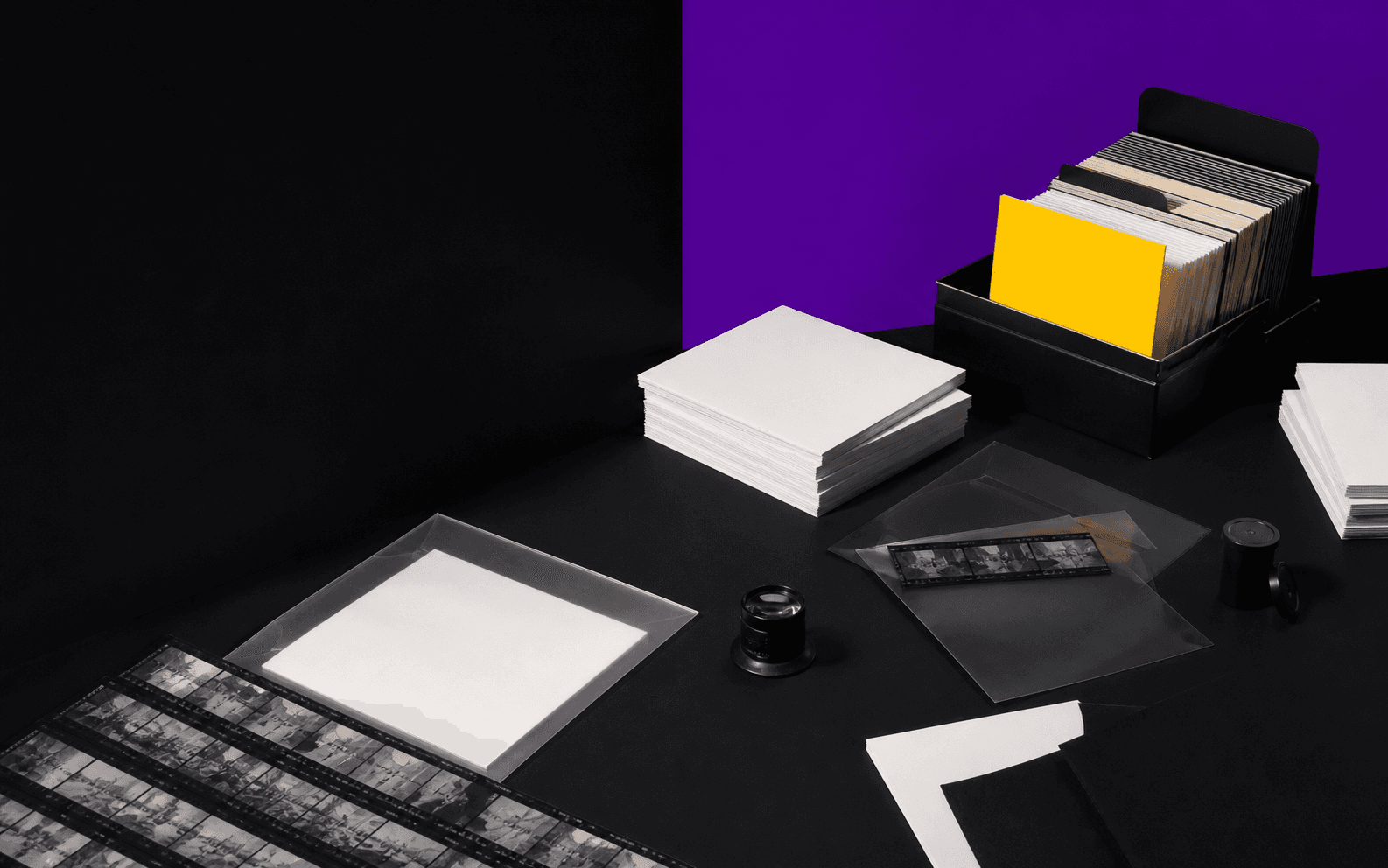 Cultural archive of paper and film representing durable media ownership.